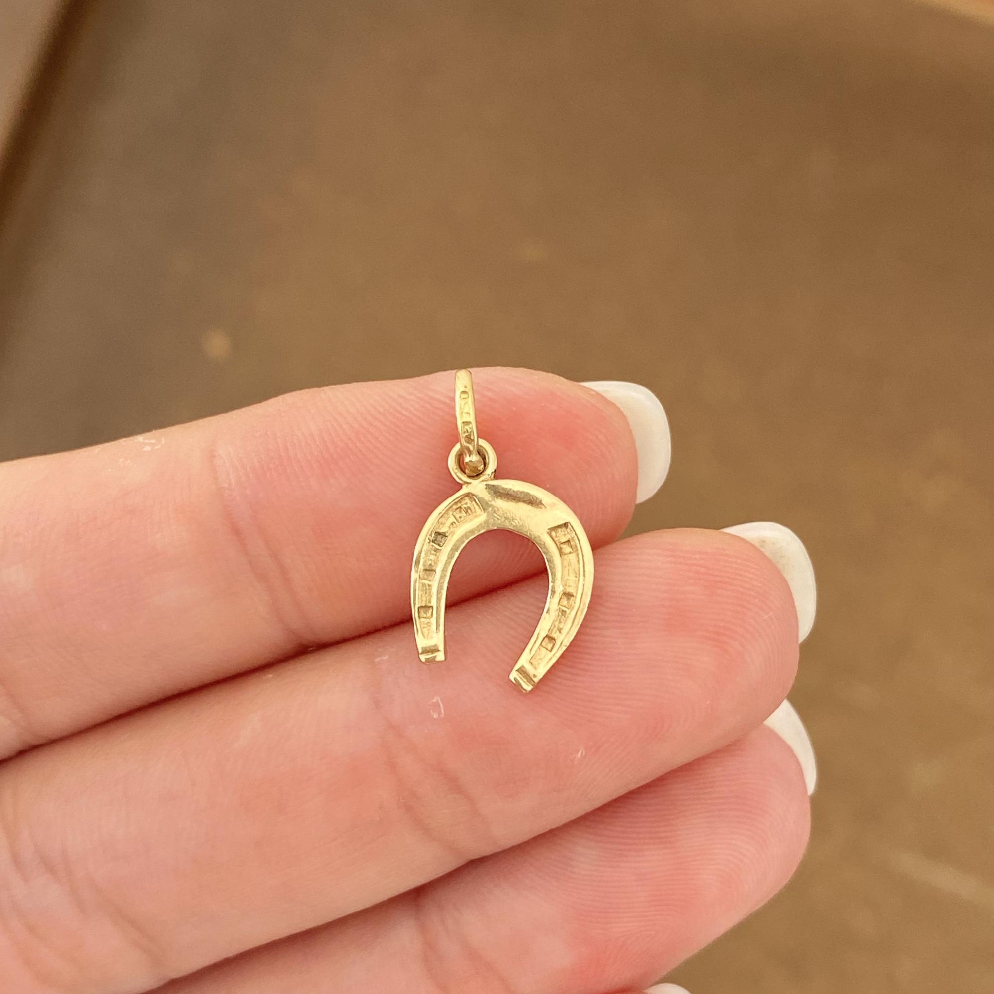 Vintage 18kt gold lucky horseshoe pendant